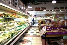 a grocery store filled with lots of fresh produce