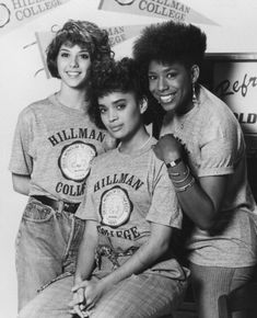 three young women are posing for a black and white photo