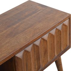 a wooden table with four drawers and one drawer on the top, in front of a white background