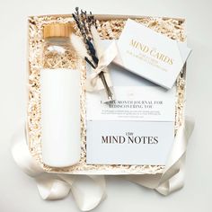 Our Mindful Pause gift is all about positive well-being. It inspires you to be rooted in the present moment, serves as a reminder to pause and reflect and helps to bring mindfulness to our days so we can live our most intentional and fulfilled life. Makes a lovely and thoughtful gift for friends and family, a gift for employees, a birthday gift, a gift for someone going through a divorce or for anyone who is starting a new journey in their life. Gift Box includes: Mind Notes Journal - a six-mont Mindful Gifts, Present Patient Peaceful, Meditation Gift Basket, Self Soothing Kit, Self Care Gift Bundles, Healthy Hydration, Gift Boxes With Lids, Selenite Wands, Notes Journal