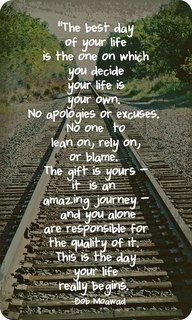 a train track with an inspirational quote on it