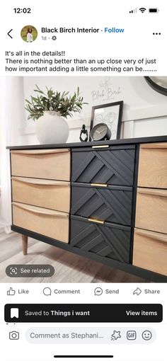 a black and white dresser with wooden drawers