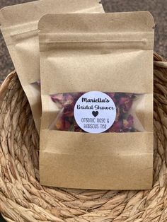 two bags of candies sitting on top of a basket