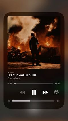 an iphone screen with the words let the world burn on it and a man standing in front of a fire