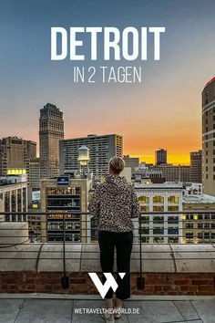 a woman standing on top of a building with the words detroit in 2 tagen