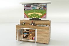 an entertainment center with a baseball game on the tv in it's centerpiece