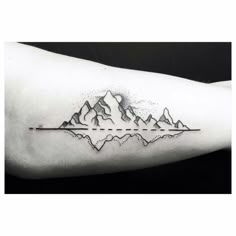 a black and white photo of mountains with dots on the upper half of the arm