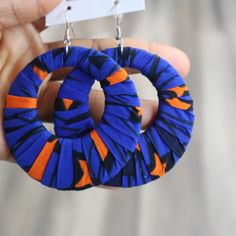 African Fabric Wrapped Earrings Style: Circle Outer Diameter: 2.75 Inches Blue Hoop Earrings With Ear Wire, Handmade Blue Round Hoop Earrings, Handmade Small Hoop Blue Earrings, Handmade Small Blue Hoop Earrings, Fabric Earring, Ankara Earrings, Orange Star, Africa Earrings, Fabric Earrings