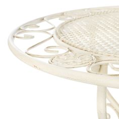 Create an al fresco lifestyle reminiscent of Tuscanys romantic charm with this 3 piece Semly Bistro Set. Inspired by the work of master artisans, each iron scroll and harp detail on its table and two chairs are finished in a pearl white hue, lending classic Italian warmth to your outdoor oasis.For over 100 years, SAFAVIEH has set the standard for finely crafted rugs and home furnishings. From coveted fresh and trendy designs to timeless heirloom-quality pieces, expressing your unique personal style has never been easier. Begin your rug, furniture, lighting, outdoor, and home decor search and discover over 100,000 SAFAVIEH products today. Round Extendable Table, Bistro Patio Set, Table And Two Chairs, Romantic Italian, 3 Piece Bistro Set, Outdoor Bistro Set, Iron Chair, Outdoor Living Patio, Chair Dimensions