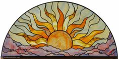 a stained glass window with the sun in it