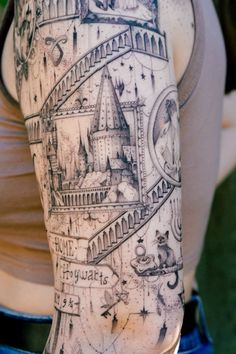 a woman's arm with an image of hogwarts castle in black and white