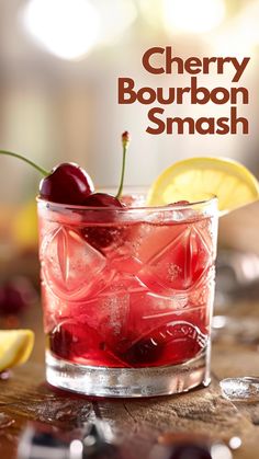 the cherry bourbon smash is served in a glass with lemon wedges and cherries