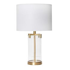 PRICES MAY VARY. This industrial-inspired table lamp showcases a cylindrical bubble glass base with brushed gold metal accents, topped with a linen drum shade Expertly crafted with a stunning mix of materials and textures, this piece will bring warmth and serenity to a space of any style from minimalist to transitional with ambient diffused light Equipped with a rotary switch Maximum 60W bulb not included Lamp measures 15 inches L x 15 inches W x 26.5 inches H Neutral Lamps, Gold Light Fixture, Dorm Room Styles, Nightstand Light, Big Room, Lamps Bedroom, Lamp Gold, Bedroom Light Fixtures, Metal Table Lamp