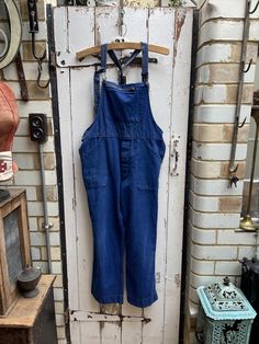 Vintage French blue cotton dungarees workwear overalls size M. 100% Cotton. No maker's label apparent.  Adjustable straps with metal clips, top zip pocket, 2 buttons at sides, pockets, back pocket, slim leg tool pocket, button fly. Size:  Waist: 40 inches; Length: 48 inches (from bib to hem); leg inseam: 26.5 inches. Weight: allow up to 2 kg once packed. Reasonable vintage condition - shoulder straps are non-matching (from an older pair of dungarees) but all part of their charm and character.  P Cotton Dungaree, Workwear Overalls, Mens Overalls, French Blue, Slim Leg, Dungarees, Slim Legs, Vintage French, French Vintage