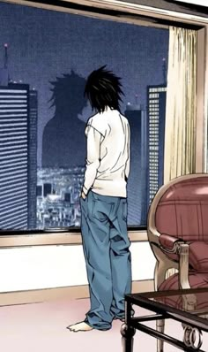 a person standing in front of a window looking out at the city