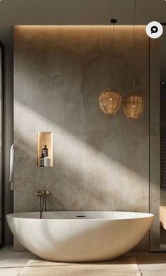 a large white bath tub sitting in a bathroom