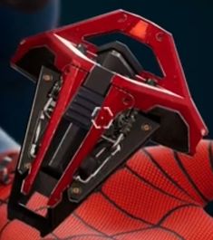 a close up of a red and black spider - man shoe with scissors in it