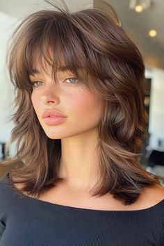 Elevate your style with this rich mocha shaggy lob, featuring layered texture and a full fringe for a standout look. The layers add depth and movement, while the fringe frames the face beautifully for a bold, modern edge ✨ Shoulder Length With Layers And Bangs, Medium Layered Shag With Fringe, Shaggy Layers With Bangs, Shag With Fringe, Types Of Fringes, Layered Bob With Fringe, Shaggy Long Bob, Layered Shag With Fringe, Lob With Fringe