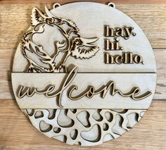 a wooden sign that says, may lil hello welcome with an image of a dog on it