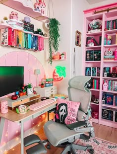 a desk with a chair, computer monitor and bookshelves