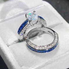 Gender: WomenMaterial: Cubic ZirconiaItem Type: RingsMetals Type: 10K white gold filledStone weight: 4ctRing box: YESStone size: 6mm*6mmStone: Blue sapphire Royal Blue Wedding Ring, His And Her Wedding Rings, I Love You Ring, Blue Wedding Rings, 6th Form, Shopping Jewelry, Sapphire Gem, High Jewellery, Simulated Diamond Rings