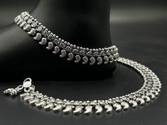 Name of product:  925 Sterling Silver Light Weight Anklet / Silver Payal Weight: 74.50 grams. Length: 26.5centimeter  Stamped: 925 FREE EXPRESS SHIPPING -----Feedback::- A satisfied customer is our top priority and your feedback forms the backbone of our success. Don't forget to give positive feedback along with good ratings. Thank You Silver Anklets With Latkans For Wedding, Silver Wedding Anklets With Latkans, Silver Anklets With Latkans As A Gift, Silver Anklets For Festivals, Silver Anklet As A Gift, Elegant Silver Anklets With Latkans, Elegant Silver Anklets For Festive Occasions, Silver Elegant Festive Anklets, Payal Silver