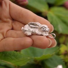 PLEASE NOTE - this pendant is Made-To-Order and takes 3-5 weeks to make. 🌿 Calling all Nature Enthusiasts and Animal Lovers! 🍃 🍃 Introducing the Highly Detailed Sterling Silver Rabbit Necklace : This rabbit pendant makes unique and meaningful gift any nature of animal lover 🍃 📏 Specifications: *Length: 3.5cm *Width: 1.7cm *Weight: 20 grams of Solid Sterling Silver 💎 🍃 Crafted with Love: This is an original piece, handcrafted with passion. I design, sculpt, mould, and hand finish my pieces Handmade Silver Jewelry For Gift, Rabbit Necklace, Rabbit Jewelry, Rabbit Pendant, Lucky Rabbit, Rabbit Lover, Cute Rabbit, Gift Cute, I Design