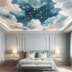 the ceiling is painted with stars and clouds in this bedroom, it has a large white bed