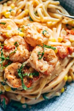 pasta with shrimp and corn in a bowl