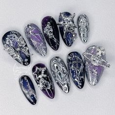 Welcome to 𝗟𝘂𝗺𝗶𝗻𝟴 𝗦𝘁𝘂𝗱𝗶𝗼 ! This is a one-person small business, based in Thailand. Nail art is my only passion in life and I'm still exploring. I'm trying to create more unique sets and take my work to the next level. So please stay tuned for my upcoming pieces  *̀ᴗ*̀  𝙔𝙤𝙪 𝙬𝙞𝙡𝙡 𝙧𝙚𝙘𝙚𝙞𝙫𝙚: ○ 10 handmade press on nails ○ adhersive tabs ○ cuticle stick ○ nail buffer ○ nail file ○ alcohol pad I'm also open for 𝗰𝘂𝘀𝘁𝗼𝗺 𝗼𝗿𝗱𝗲𝗿𝘀. So if you have any inquiry, please don' Purple Black And Silver Nails, Purple Silver Nails, Goth Nails Purple, Gothic Nails Purple, Purple And Black Goth Nails, Cyberpunk Nails, Witch Nails Purple And Black, Goth Airbrush Nails, Purple Punk