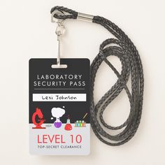 a lanyard with an id tag attached to it that reads laboratory security pass level 10 top - secret clearance