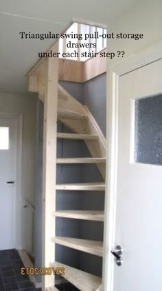 there is a staircase built out of storage drawers under each stair step? and the caption says, triangular saving pull - out storage drawers under each stair step?