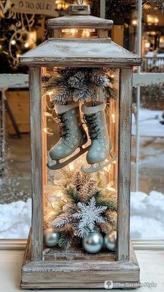 a lantern filled with christmas decorations and lights