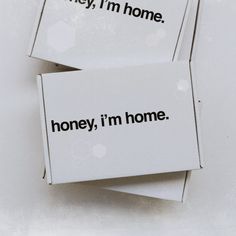 two boxes with the words honey, i'm home on them