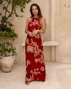 The River of Roses Halter Dress is the perfect combination of sophistication and simplicity. Its flowing and elegant design makes it the ideal choice for those seeking a serene and refined presence.