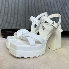 Asos Chunky White Platform Sandals. New Only Worn Inside Once. Heel And Platform Is Rubber. Sandal Straps Are A Faux Suede. Very Comfortable But Never Worn Except The One Time. From A Smoke-Free Home. Make Me An Offer! Polyurethane Open Toe Sandals With Buckle Closure, White Polyurethane Sandals For Summer, Faux Leather Sandals With Chunky Platform And Block Heel, Chunky Platform Faux Leather Sandals For Spring, Chunky Platform Sandals In Faux Leather For Spring, White Faux Leather Heels For Summer, Spring Heels With Buckle Closure, Spring Polyurethane Heels With Buckle Closure, White Faux Leather Sandals For Summer