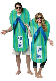 man and woman in matching beach towels with sunflowers on the front, one wearing sunglasses