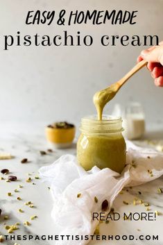 homemade pistachio cream in a jar with a spoon