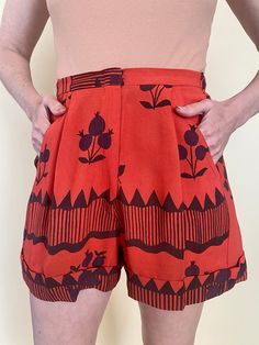 "Ossie Clark Vintage red shorts in Celia Birtwell Print Made of Crepe Moss. Zipper Front with Snap Closure and Cuffs at Hem. Elastic was Added at Waist. Side Hidden Pockets *Dress is NOT INCLUDED, Its is Sold Seperataly listed separately on my page. Measurements: Waist 26-28\" Elastic at Waist. Hips: 48\" (Widest Part) Condition: Great No Visible Signs of Holes or Stains. Has a Few Snags. Elastic was Added Waist. Please Message me any questions before Purchasing as this Item is Non Returnable an Retro Red Short Shorts, Retro Red Shorts For Summer, Retro Red Shorts, Red Bermuda Cotton Shorts, Red Cotton Bermuda Shorts, Red Bermuda Bottoms For Summer, Red Bermuda Shorts For Summer, Retro Red Shorts With Pockets, Vintage Red Shorts For Summer