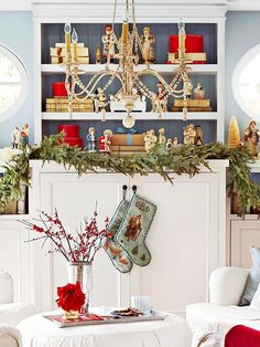 a living room filled with furniture and christmas decorations