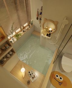 an aerial view of a bathroom with a tub, sink and toilet in the corner