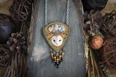 PLEASE READ FAQs BEFORE ORDERING! IMPORTANT INFORMATION ON DELIVERY TIME IS SPECIFIED THERE. The FAQs section is below the description.  Barn owl necklace. Made of polymer clay, supplemented with jasper cabochon, glass beads. This necklace will be an excellent gift for the lover of owls and unusual jewelry. Materials: polymer clay, jasper, glass, stainless steel. The size: 8.5*5 cm (3.4*2 inch)(with beads), length - 42 cm (16 inch). This pendant in a single copy. Other animal necklace: https://w Barn Owl Necklace, Owl Totem, Witchy Necklace, Earrings Cottagecore, Cottagecore Earrings, Forest Jewelry, Witch Earrings, Jewelry Materials, Animal Necklace