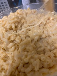 macaroni and cheese in a clear bowl