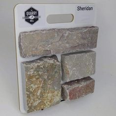 a pack of four stone blocks sitting on top of each other