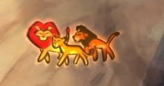 the lion and the lamb are standing next to each other in front of a heart