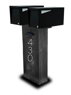 a black mailbox with the number 4200 on it's front and side