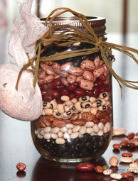 a jar filled with lots of different types of nuts