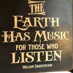 a sign that says the earth has music for those who listen to them with shakespeare written on it