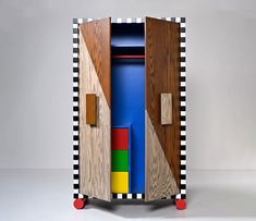 a wooden cabinet with different colored sections on it