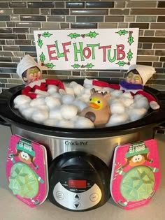 an elf hot tub with marshmallows and snowballs in it for christmas